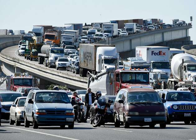 Slaying suspect killed by police on I-80 amid chaotic day on Bay Area roads