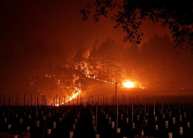 Fires charge on, threatening Wine Country cities, killing 23 and transforming region into disaster zone